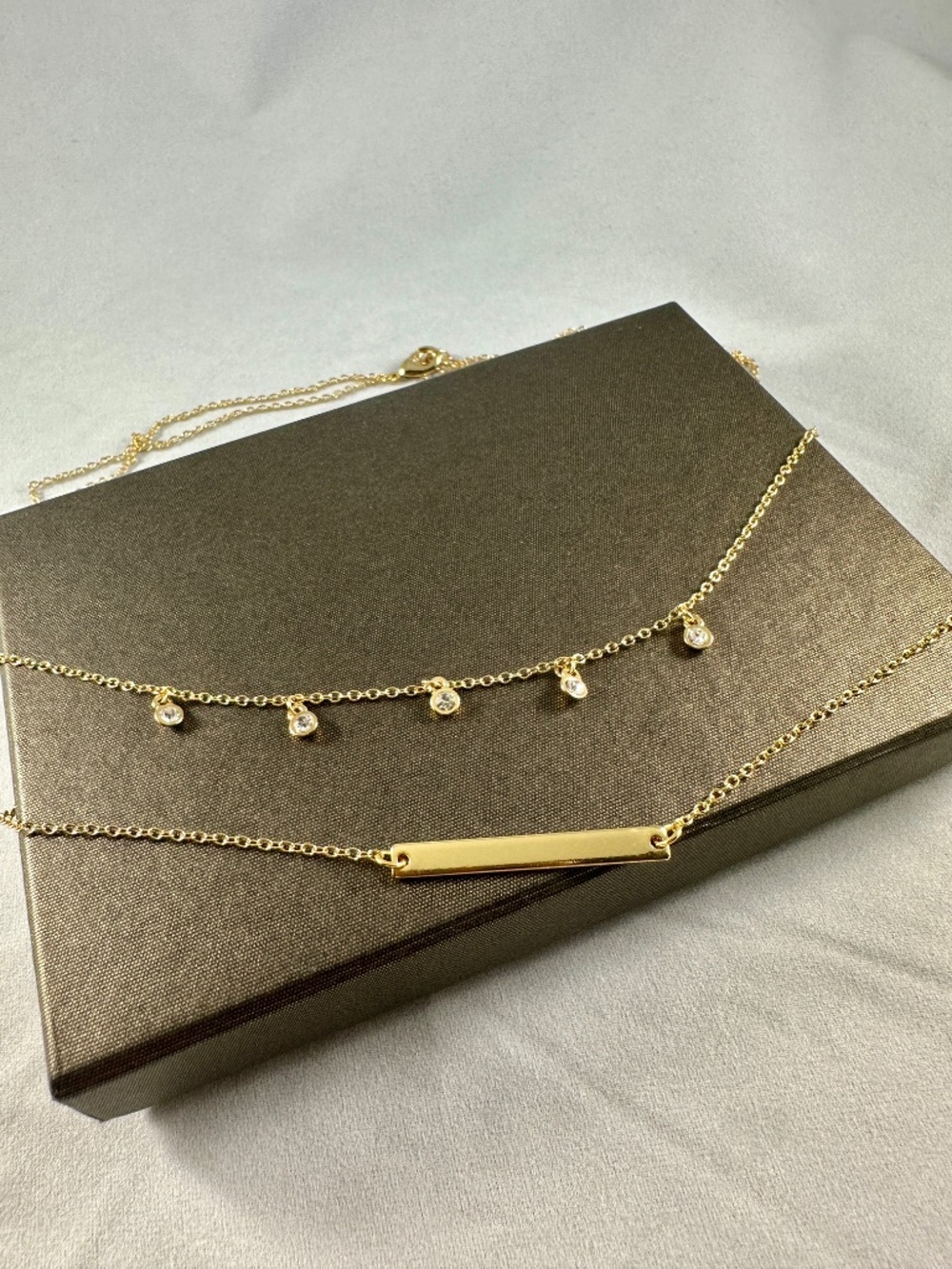Gold Tone Layered Bar Necklace with Crystal Drop Charms
